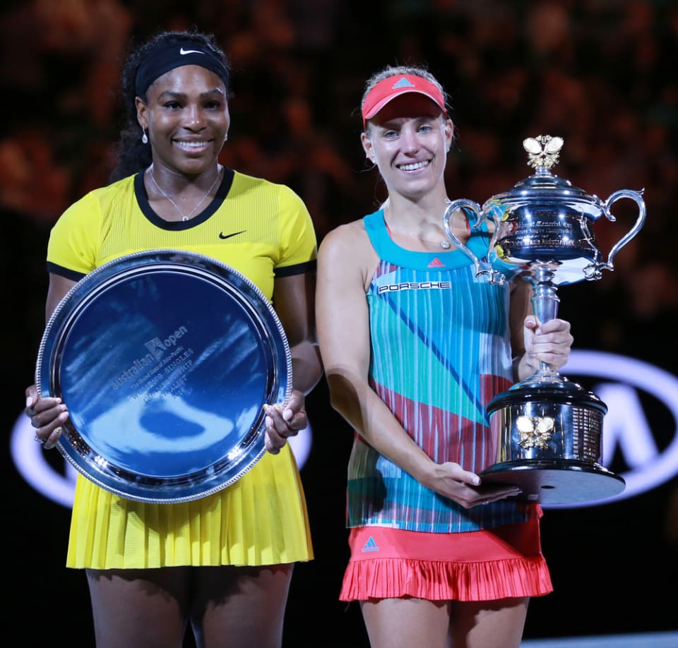 MELBOURNE, AUSTRALIA - JANUARY 30, 2016:Australian Open 2016 finalist Serena Williams (L) and Grand Slam champion Angelique Kerber of Germany during trophy presentation after final match in Melbourne (Photo Credit: Leonard Zhukovsky)