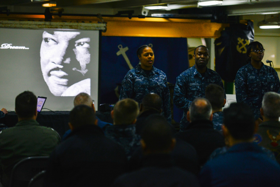 150226-N-TC437-060 BREMERTON, Wash. (Feb. 26, 2015) Aviation Boatswain's Mate (Fuel) Airman Myste Shadie, Aviation Boatswain's Mate (Fuel) 3rd Class Carl Johnson and Aviation Boatswain's Mate (Fuel) Airman Shalida Dixon recite a poem during an African-American History Month ceremony aboard the Nimitz-class aircraft carrier USS John C. Stennis. John C. Stennis (CVN 74) is undergoing an operational training period in preparation for future deployments. (U.S. Navy photo by Mass Communication Specialist 3rd Class Ignacio D. Perez/Released)