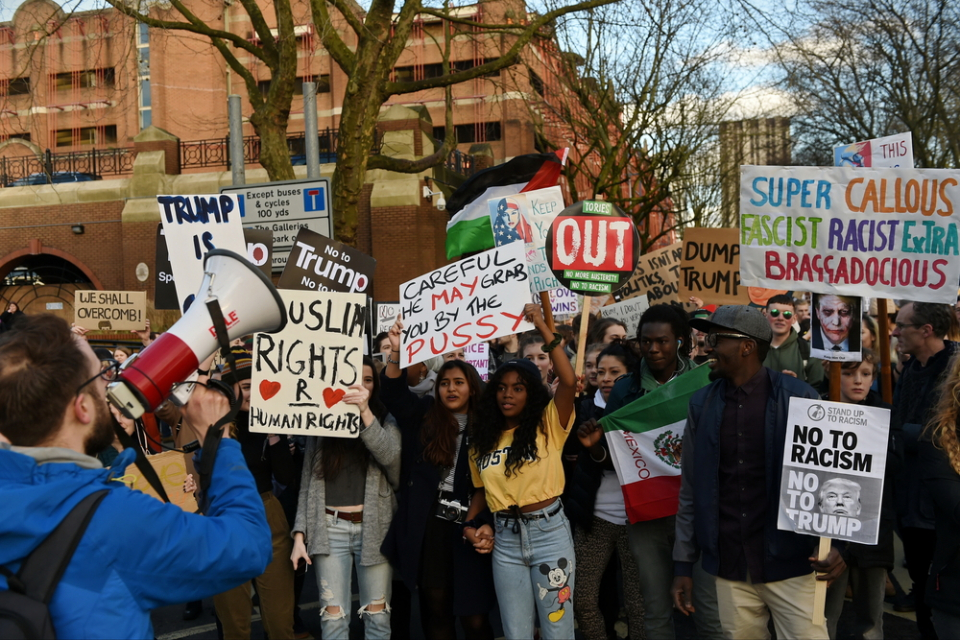Bristol, UK - February 4, 2017: Protesters march through the city centre demonstrating against US President Donald Trump's UK visit and his order banning travel to the USA from seven Muslim countries. (Photo Credit: 1000 Words/via shutterstock)