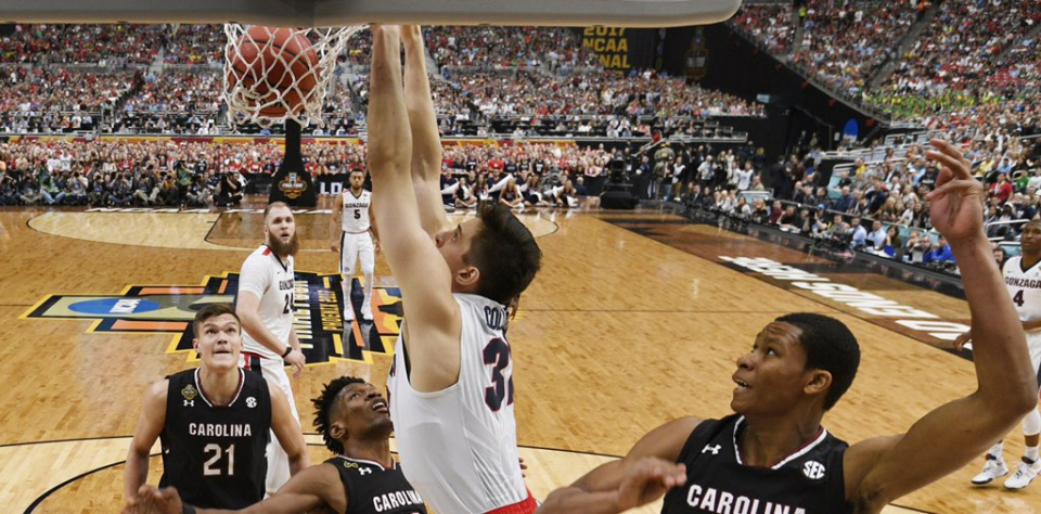 (Photo from @ZagMBB/ Twitter) Gonzaga freshman forward Zach Collins dunks against South Carolina in NCAA men's basketball semifinal on April 1.