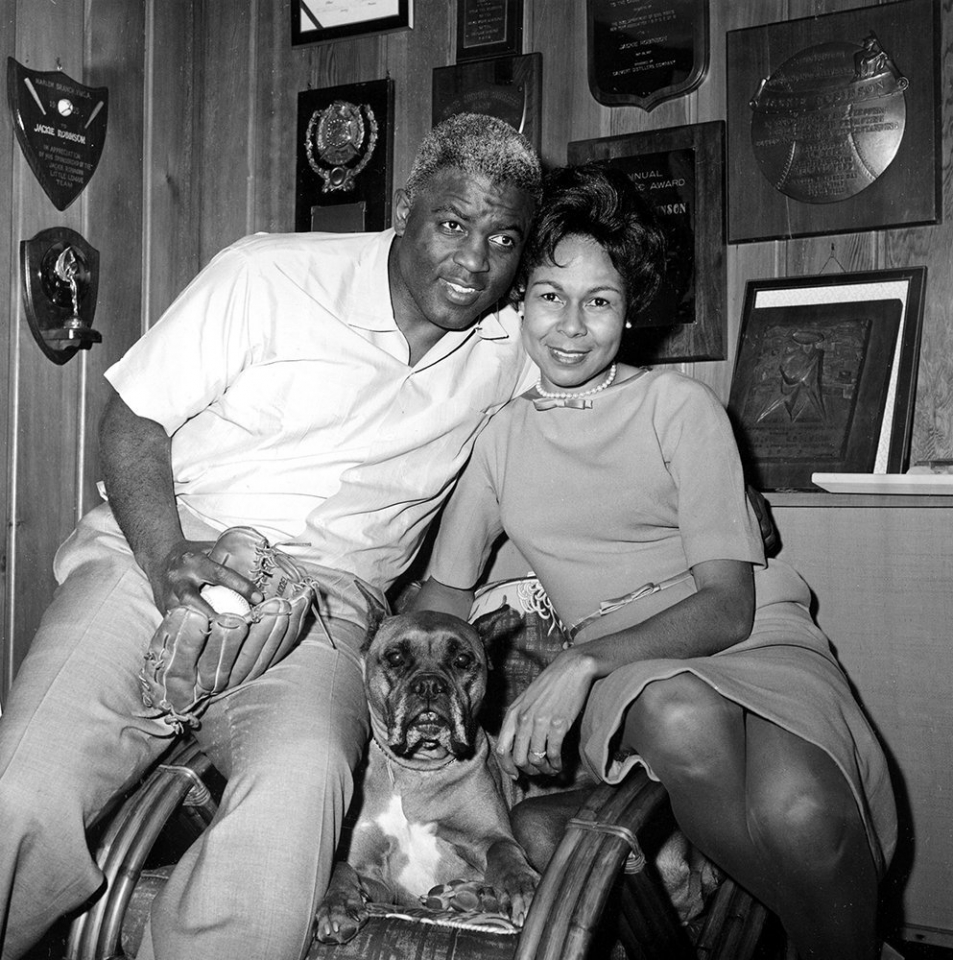 (Photo from @JRFoundation/Twitter) Jackie Robinson, his wife, and family dog pose for a picture.
