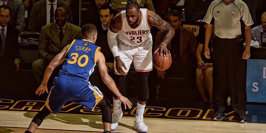 (Photo from @cavs/ Twitter) Cleveland Cavaliers forward LeBron James sizes up Golden State Warriors guard Stephen Curry in the 2016 NBA Finals.