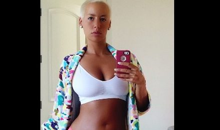 Amber Rose's giant forehead tattoos horrify fans (photos)