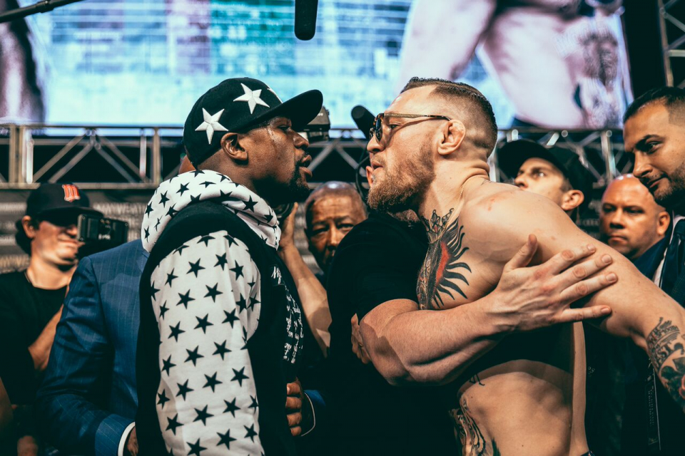 Floyd Mayweather and Conor McGregor facing off in Brooklyn, New York (Photo courtesy of Rosie Cohe /SHOWTIME)
