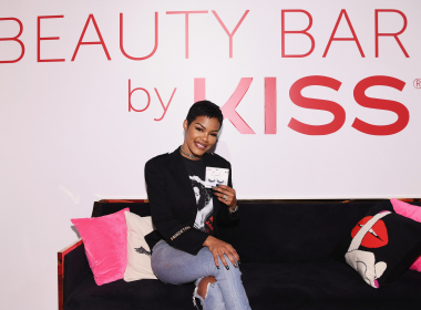 Teyana Taylor puckers and flutters for Kiss Products' pop-up beauty bar