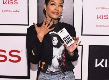 Teyana Taylor puckers and flutters for Kiss Products' pop-up beauty bar