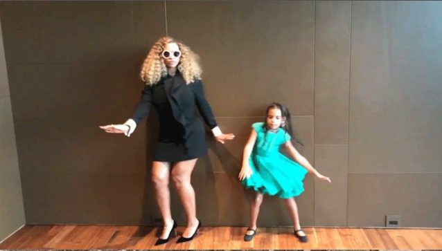 Beyoncé means business in black minidress, busts a move with baby Blue