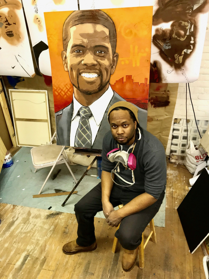 Minneapolis artist Reggie LeFlore paints Mayor Melvin Carter