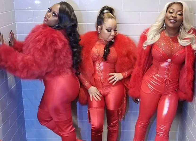Tiny Harris unveils red bodysuit in concert, and fans love it