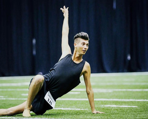 Two Black men make history as first EVER male cheerleaders to