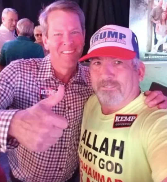 Brian Kemp posed with White man who threatened to kill Black women and kids
