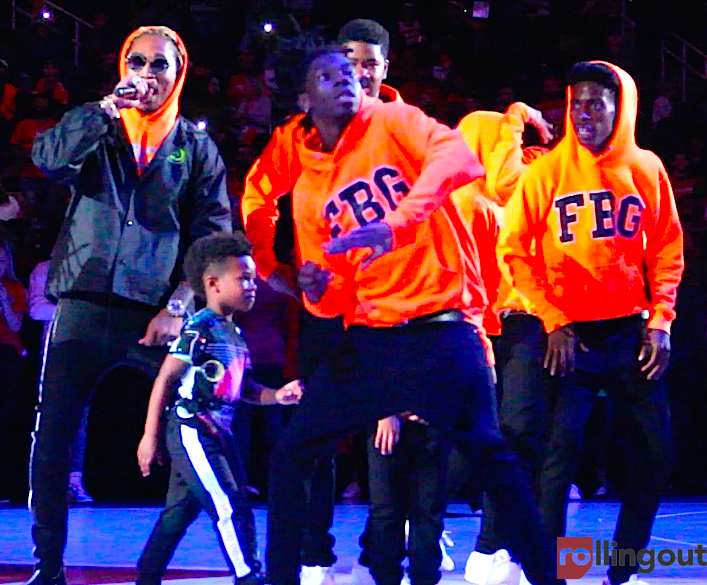 Rapper Future dances with his son baby Future during recent concert