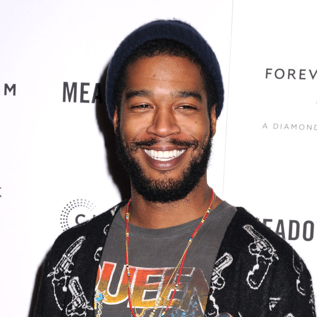 Rapper Kid Cudi teases new music