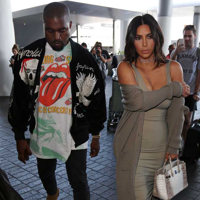 Kim Kardashian is helping Kanye West understand politics