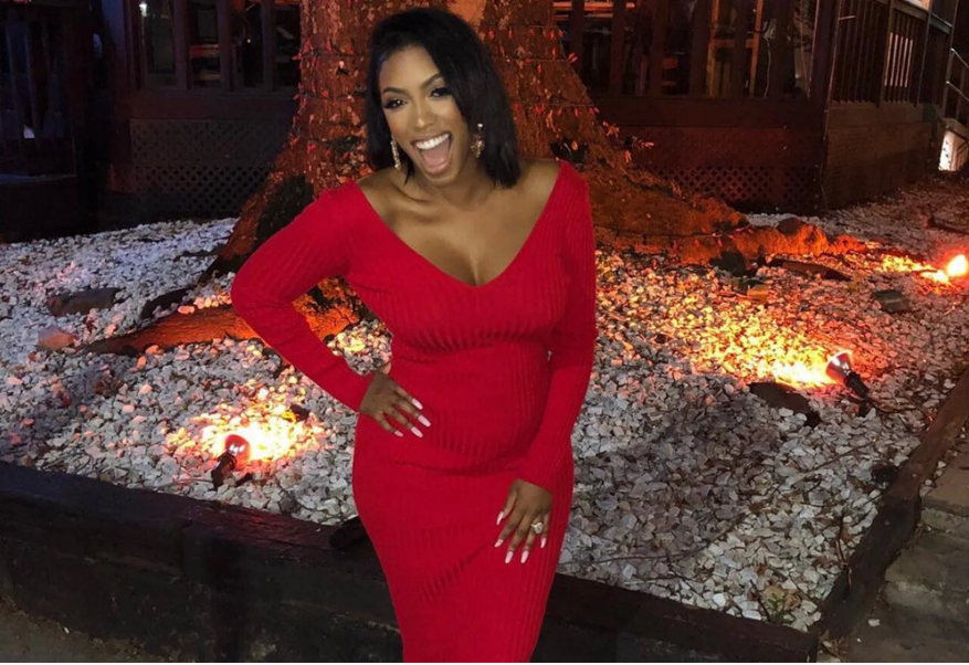 'RHOA's' Porsha Williams shows off engagement ring and growing baby bump