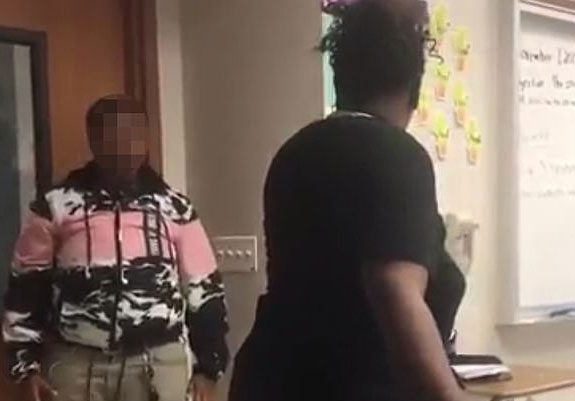Teacher returns to class after cancer surgery and is punched by student (video)