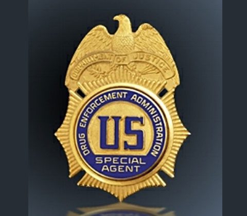 dea badge drugs cop gang joined guns chicago then area sold teams gov source