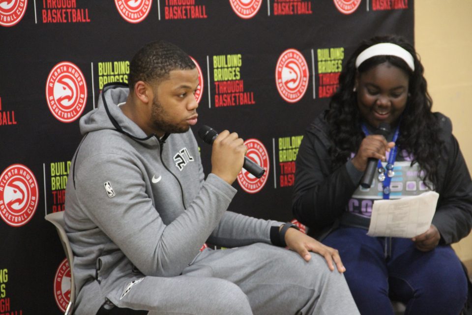 Hawks' Omari Spellman inspires kids to find their voice through poetry