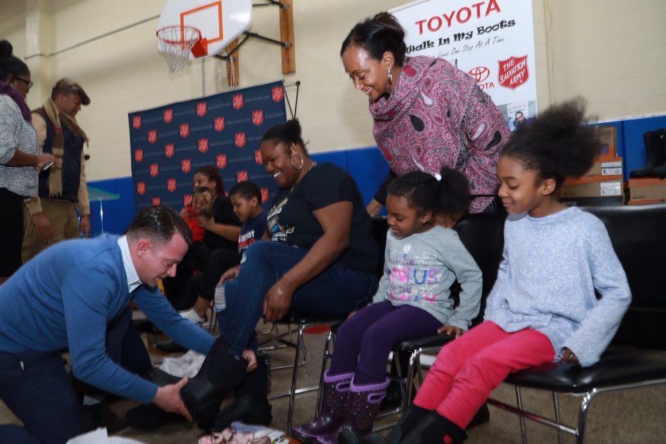 Toyota kicked off auto show week by donating winter boots to families in need