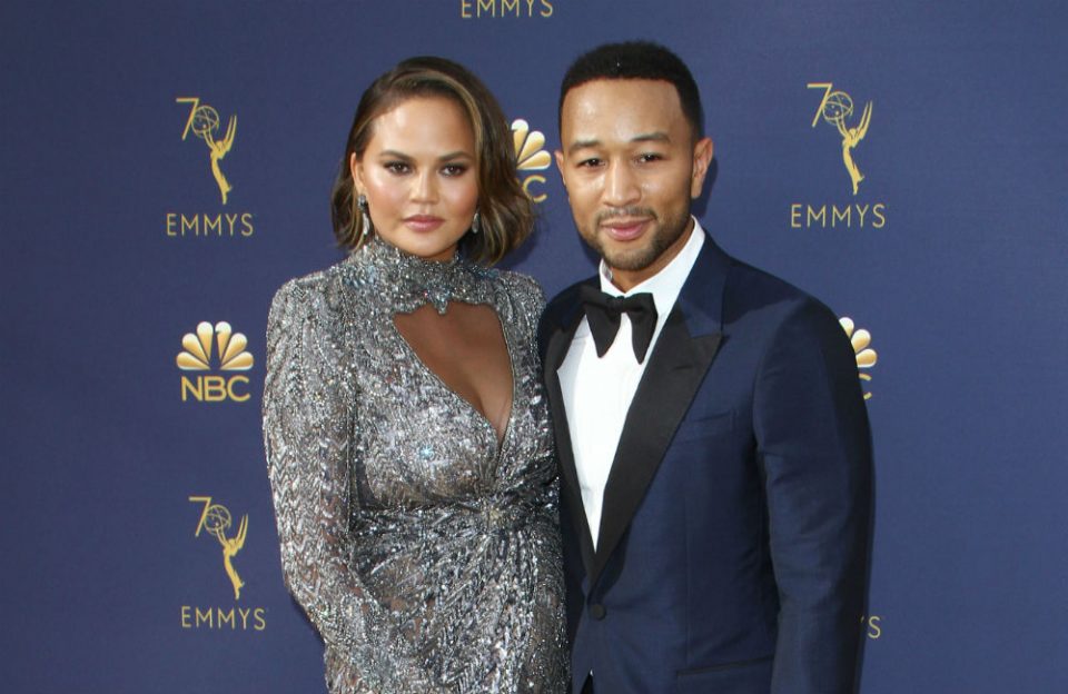 Family food fight: Chrissy Teigen and John Legend battle it out in the kitchen