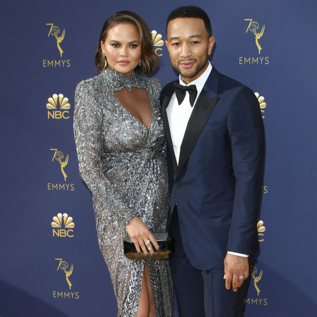 Why John Legend had to kick Chrissy Teigen out