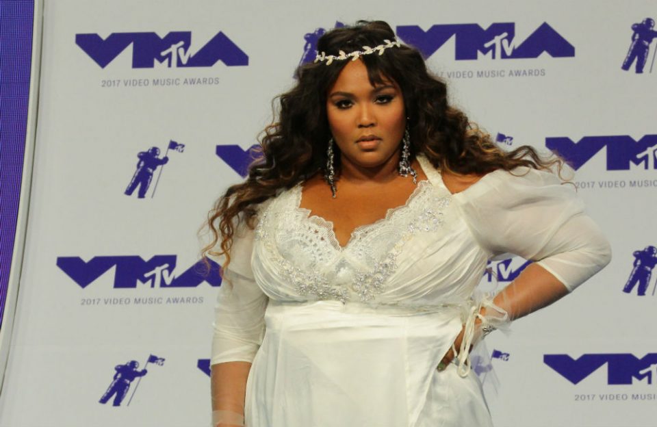 Lizzo tells the critics of her thong flashing what they can do (video)