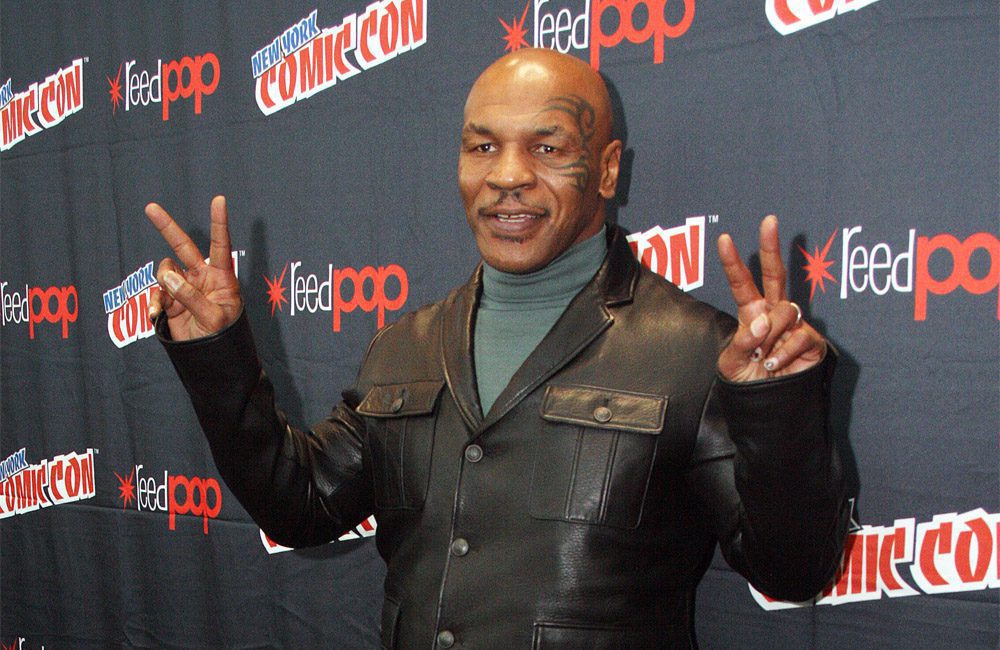 Watch Mike Tyson sneak up on unsuspecting people (video)
