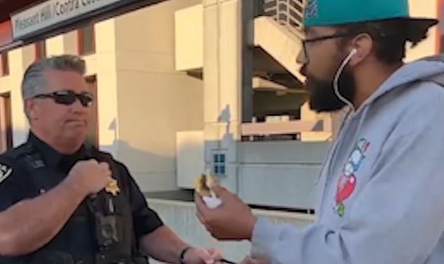 White cop attempts to arrest Black man for eating a sandwich (video)