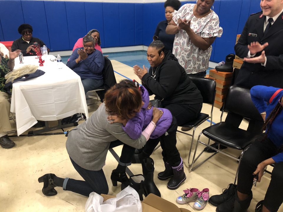 Toyota continues to effect change by donating winter boots to homeless families