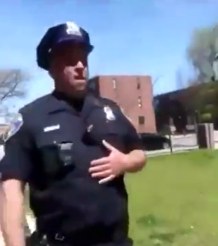 White cop purposely coughs on residents of Baltimore housing project (video)