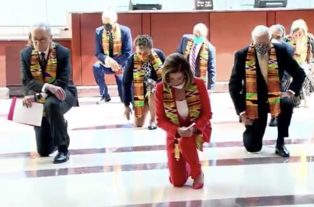 Politicians draped in kente cloth take a knee for George Floyd
