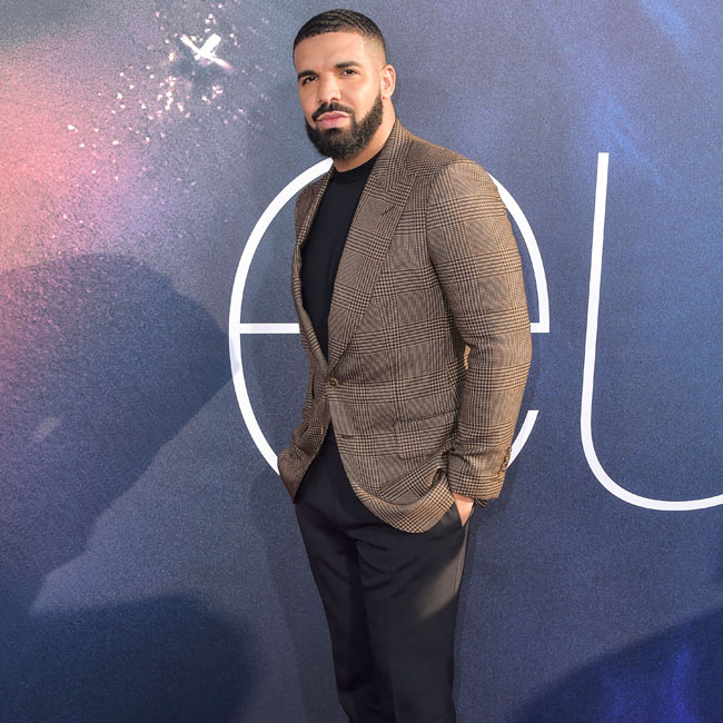 Drake joined by son Adonis on stage at Billboard Music Awards (video)