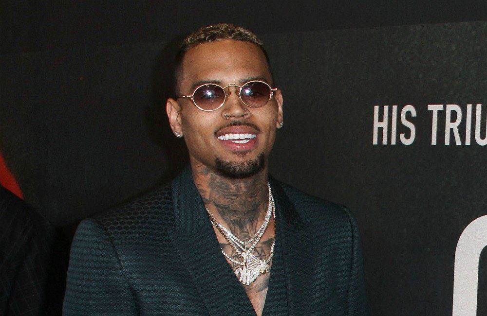 Chris Brown's lap dance causes couple to break up (photos)