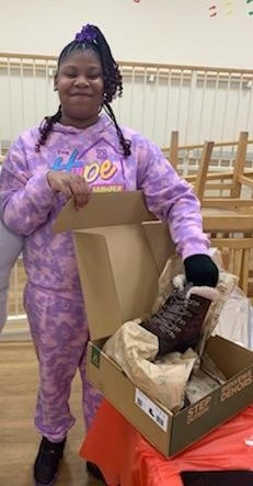 Toyota donates winter boots and socks to Chicago area homeless families