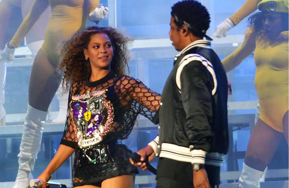 Beyonce runs her fingers through Jay-Z's new hairdo as he makes a surprise appearance at 2018 Coachella Music Festival in Indio, CA