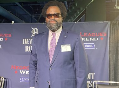 Comerica Bank SVP Irv Ashford Jr. throws first pitch during the Negro Leagues Weekend game in Detroit