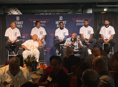 Comerica Bank SVP Irv Ashford Jr. throws first pitch during the Negro Leagues Weekend game in Detroit