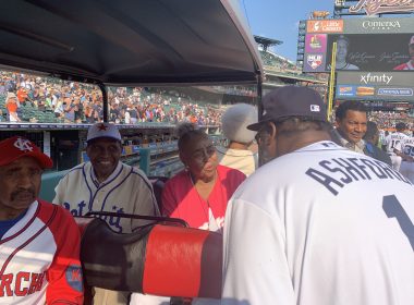 Comerica Bank SVP Irv Ashford Jr. throws first pitch during the Negro Leagues Weekend game in Detroit