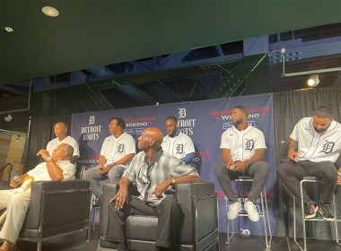 Comerica Bank SVP Irv Ashford Jr. throws first pitch during the Negro Leagues Weekend game in Detroit