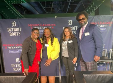 Comerica Bank SVP Irv Ashford Jr. throws first pitch during the Negro Leagues Weekend game in Detroit