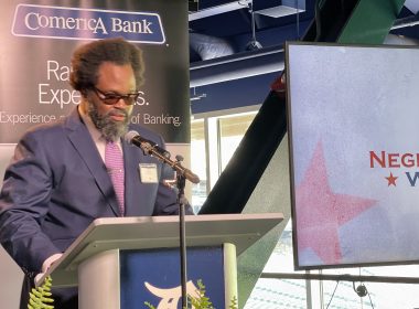 Comerica Bank SVP Irv Ashford Jr. throws first pitch during the Negro Leagues Weekend game in Detroit