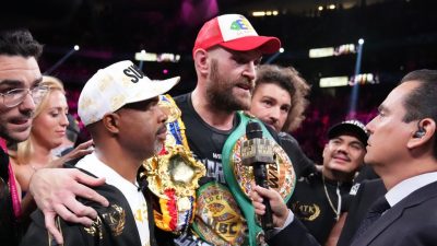 “Tyson Fury (center) is a better fighter because he wants to learn and I want to teach,” said trainer Javan “Sugar” Hill Steward (left) following Fury's 11th-round knockout of Deontay Wilder on Oct. 9 in defense of his WBC heavyweight title. (Sean Michael Ham/TGB Promotions)