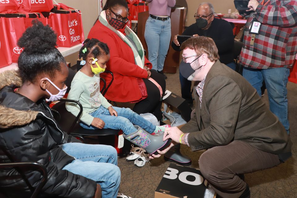 Toyota supports Detroit by donating winter boots to low-income families and providing funds to The Salvation Army