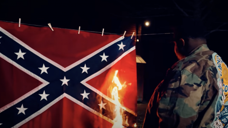US Senate candidate burns Confederate flag in latest campaign ad (video)