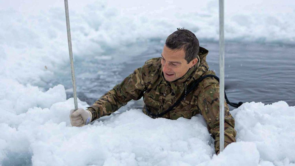 Bear Grylls completes an ice-breaking drill with the Royal Marines during Arctic exercises in Norway. (Royal Navy/Zenger)