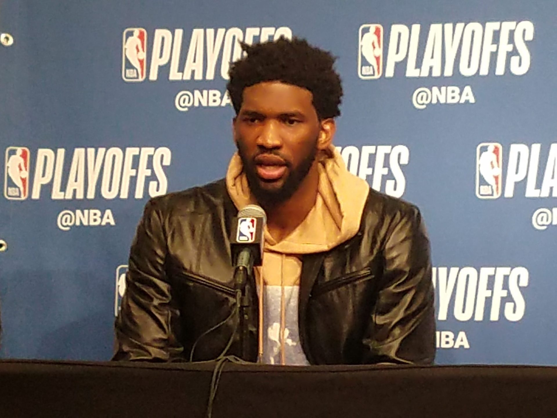 NBA star Joel Embiid at a post game press conference