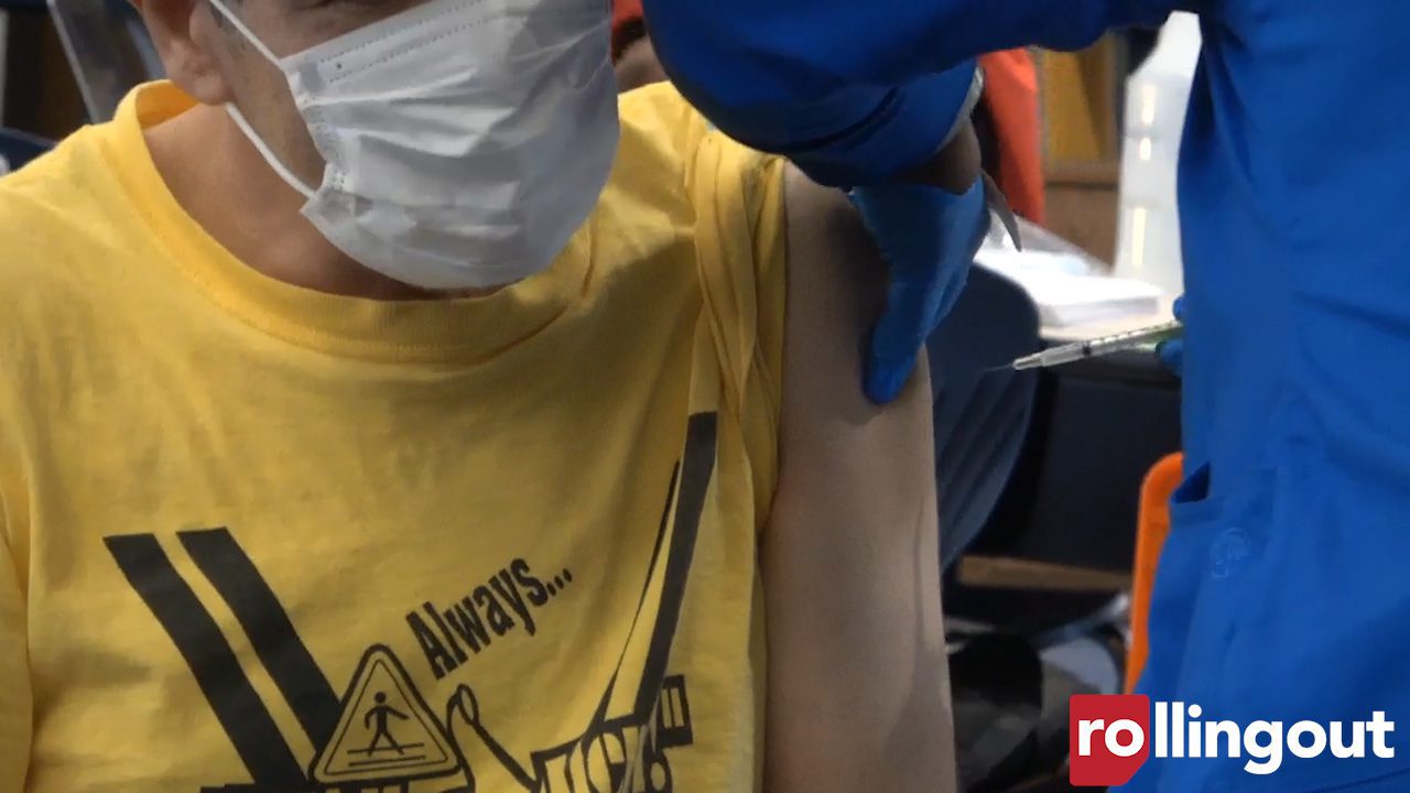 A man receiving an incentivized COVID-19 vaccine in DeKalb County.