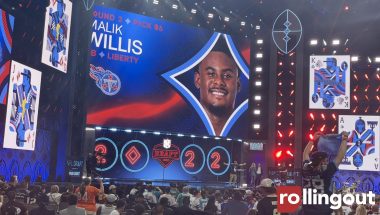 The Tennessee Titans select Liberty quarterback Malik Willis in the 2022 NFL Draft. (Photo credit: Rashad Milligan for rolling out)