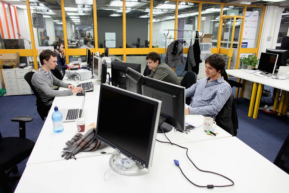 People work at computers in TechHub, an office space for technology start-up entrepreneurs, near the Old Street roundabout in Shoreditch which has been dubbed 'Silicon Roundabout' due to the number of technology companies operating from the area on March 15, 2011 in London, England.(Photo by Oli Scarff/Getty Images)