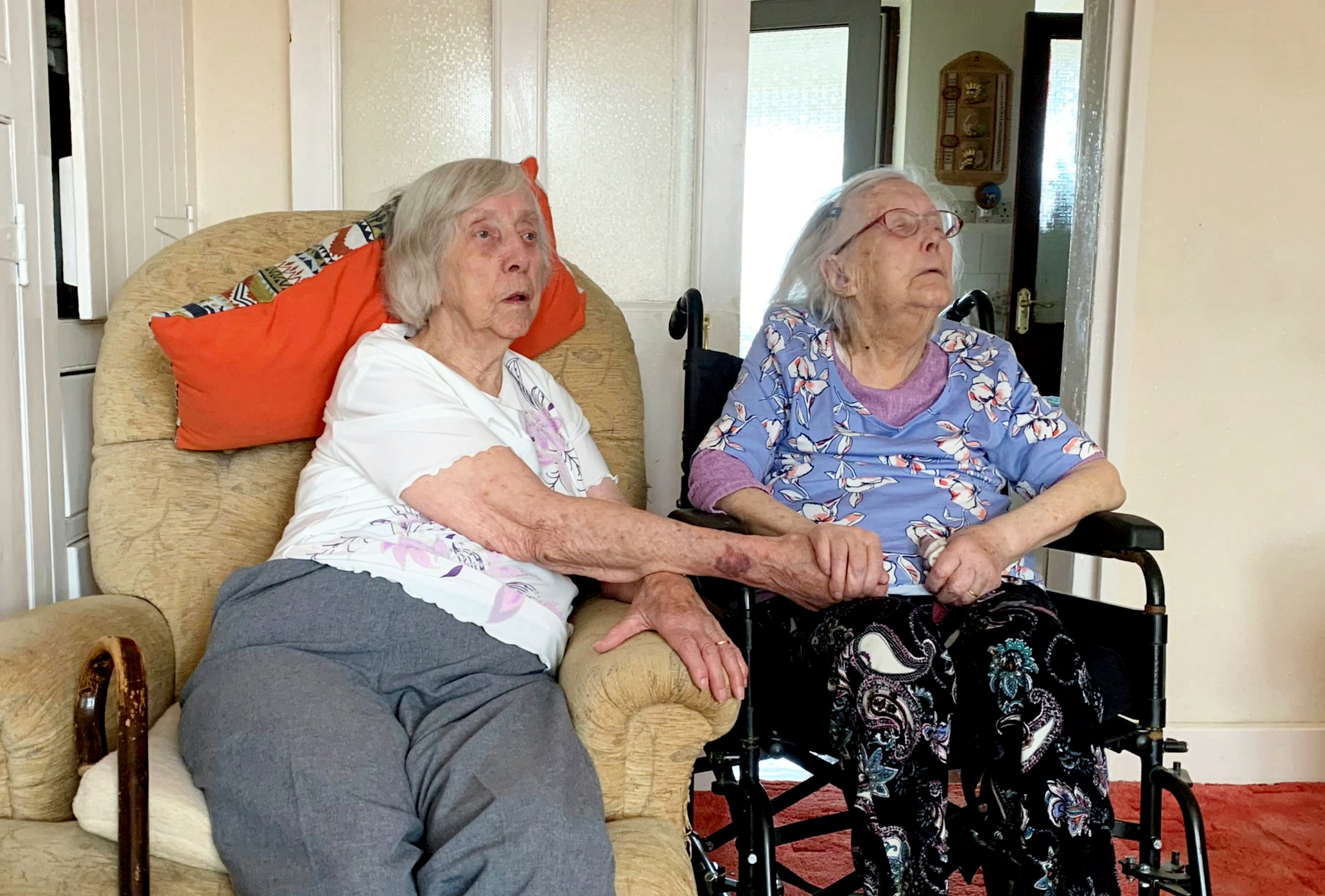 Britain's oldest twins who pride themselves on leading “frugal lives” have celebrated their 102nd birthdays – with cheese sandwiches. (Steve Chatterley, SWNS/Zenger)